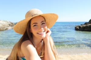 Candid,Tourist,With,Perfect,Smile,Posing,On,The,Beach,Looking